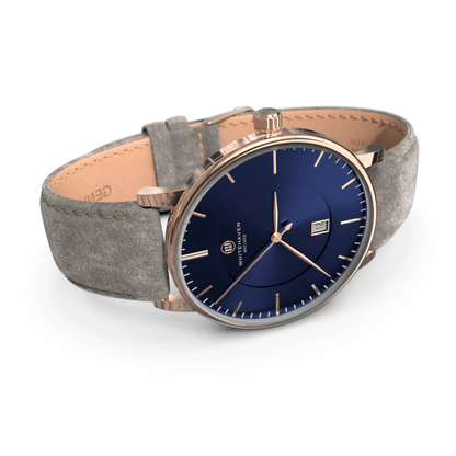 Montre pas cher / Montre élégante / Montre Mixte / Montre Intemporelle / montre à moins de 100€ / Montre 40 mm / Bracelet Daim Gris / Finitions Rose Gold / Montre couleur Bleu / Montre White Haven / Daniel Wellington / montre Daniel Wellington / Cluse / montre Cluse 