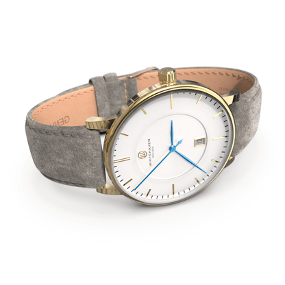 Montre pas cher / Montre élégante / Montre Mixte / Montre Intemporelle / montre à moins de 100€ / Montre 40 mm / Bracelet Daim Gris Pale / Finitions Gold / Montre couleur Blanc / Montre couleur Blanc aiguilles bleues / Montre aiguilles Bleues / Montre White Haven / Daniel Wellington / montre Daniel Wellington / Cluse / montre Cluse