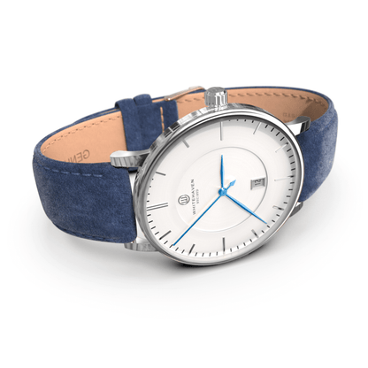 Montre pas cher / Montre élégante / Montre Mixte / Montre Intemporelle / montre à moins de 100€ / Montre 40 mm / Bracelet Daim Bleu / Finitions Argent / Montre couleur Blanc / Montre couleur Blanc aiguilles bleues / Montre aiguilles Bleues / Montre White Haven / Daniel Wellington / montre Daniel Wellington / Cluse / montre Cluse