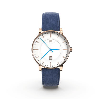 Montre pas cher / Montre élégante / Montre Mixte / Montre Intemporelle / montre à moins de 100€ / Montre 40 mm / Bracelet Daim Bleu / Finitions Rose Gold / Montre couleur Blanc / Montre couleur Blanc aiguilles bleues / Montre aiguilles Bleues / Montre White Haven / Daniel Wellington / montre Daniel Wellington / Cluse / montre Cluse