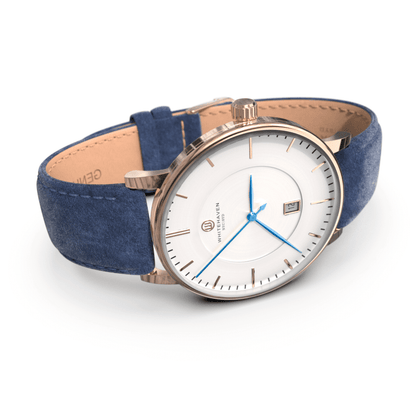 Montre pas cher / Montre élégante / Montre Mixte / Montre Intemporelle / montre à moins de 100€ / Montre 40 mm / Bracelet Daim Bleu / Finitions Rose Gold / Montre couleur Blanc / Montre couleur Blanc aiguilles bleues / Montre aiguilles Bleues / Montre White Haven / Daniel Wellington / montre Daniel Wellington / Cluse / montre Cluse