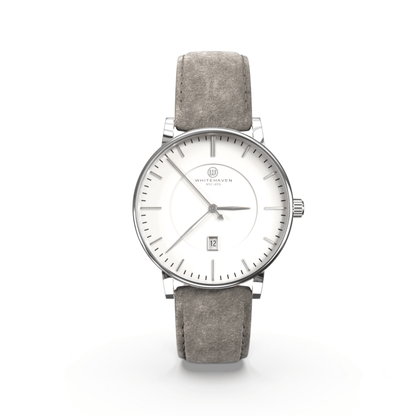 Montre femme Whitehaven Coral avec cadran blanc mat en vue frontale, finitions argentées et bracelet en velours gris clair